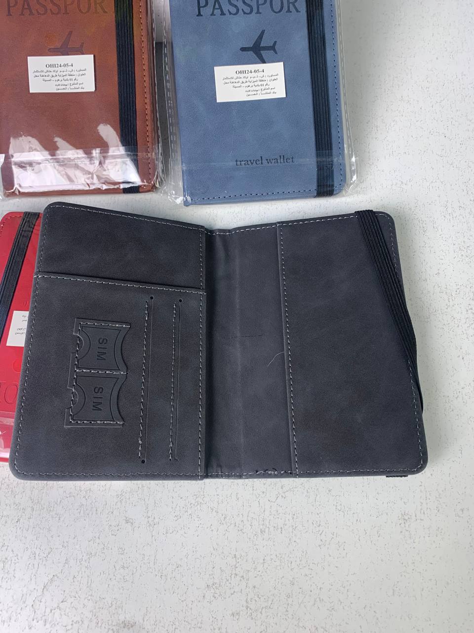 Porte-passeport en cuir à bande élastique - حافظة جواز سفر جلدية مزودة بشريط مطاطي