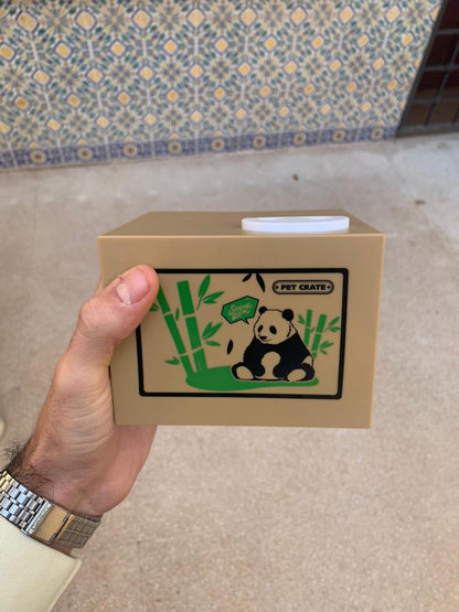 Tirelire automatique avec un mignon petit panda à l’intérieur