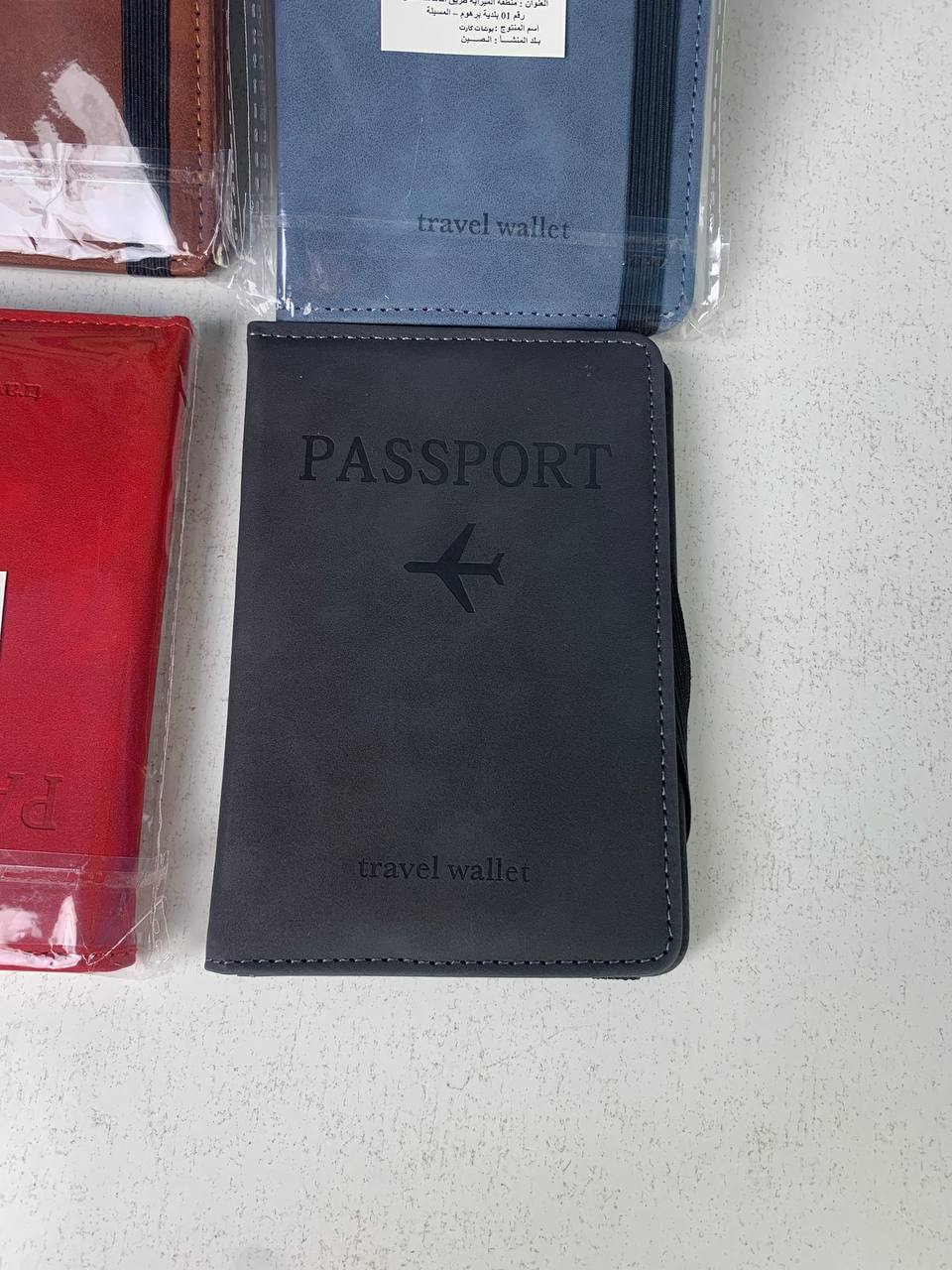 Porte-passeport en cuir à bande élastique - حافظة جواز سفر جلدية مزودة بشريط مطاطي