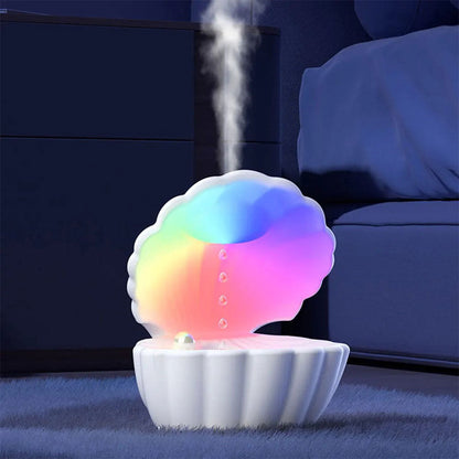 Humidificateur d’air et Haut Parleur BT avec lumière d’ambiance antigravité 550ml – مكبر صوت ومعطر جو على شكل محار البحر
